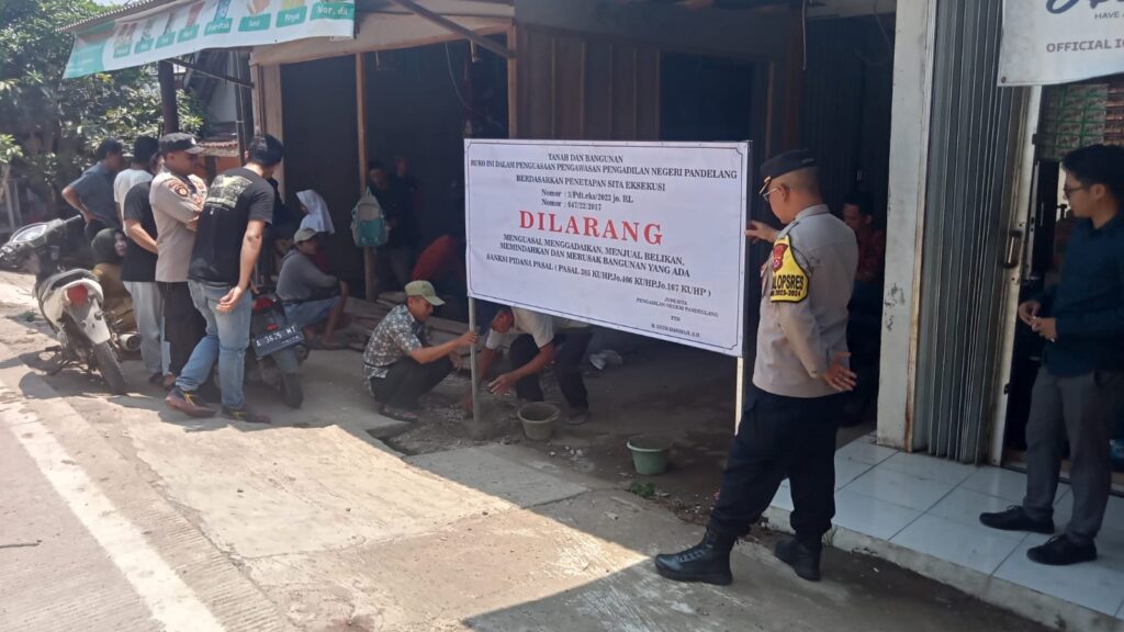 Polres Pandeglang Laksanakan Pengamanan Pembacaan Sita Eksekusi Tanah dan Bangunan di Munjul 5 WhatsApp Image 2023 11 16 at 22.26.57